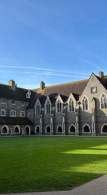 The immaculate green lawn inside Lancing College's inner courtyard