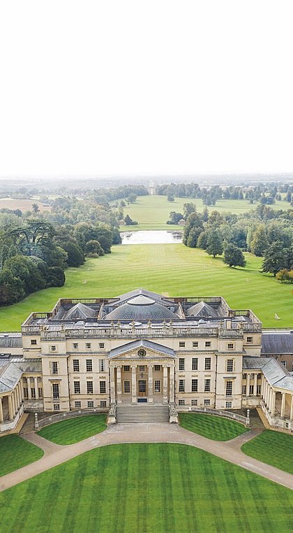 areal view of the impressive symmetric Stowe School complex and park like campus stretching out into the far distance