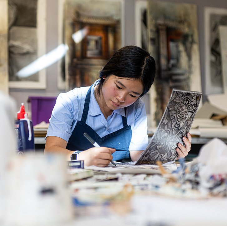 Girl immersed in a creative activity at Cheltenham Ladies College