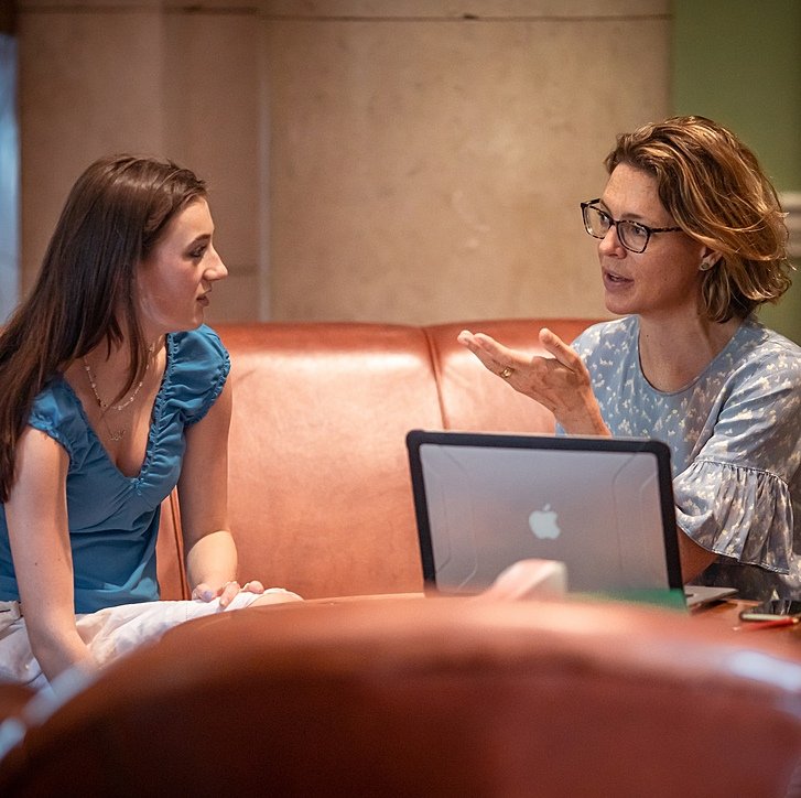 A Bryanston student chatting with her female tutor