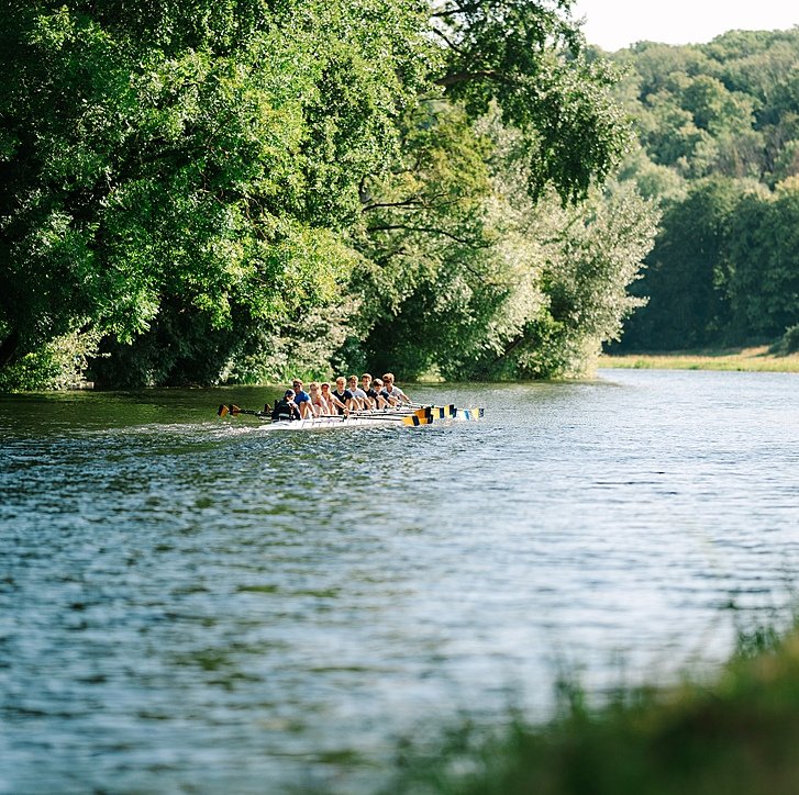 Panoramic shot of Bryanston's rowing team on a river