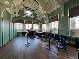 chairs in front of music stands in a crescent in a music classroom at Haileybury