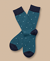 Green socks with white dots