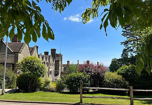 Gardens and in the left background the Worth School