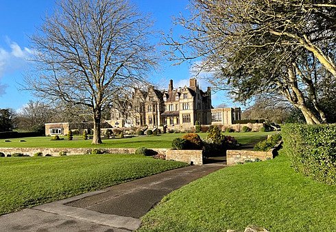 Old school building in a big park