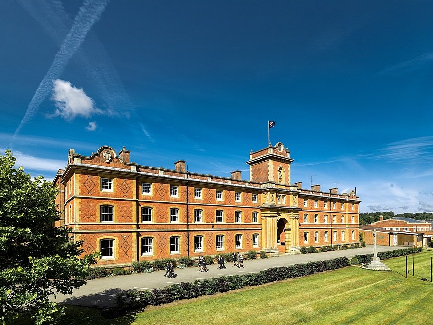 The impressive front of King Edward's School Witley