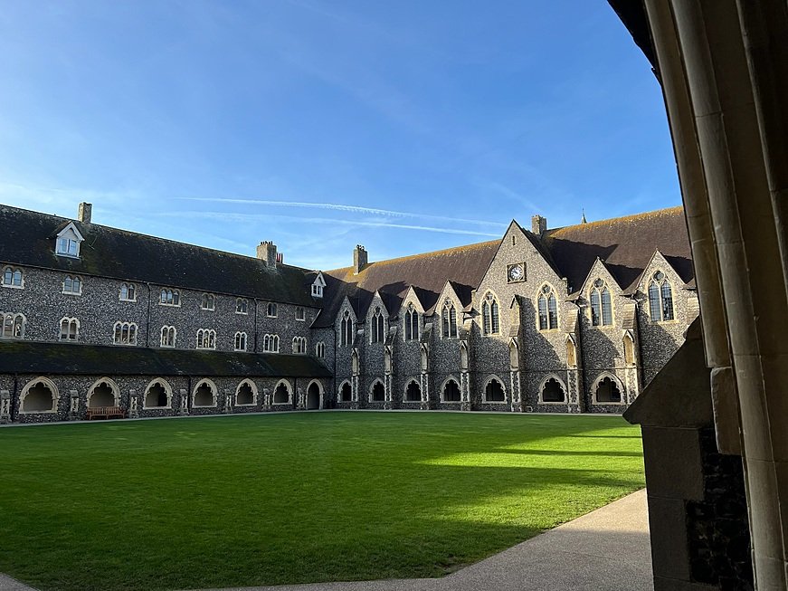 The immaculate green lawn inside Lancing College's inner courtyard