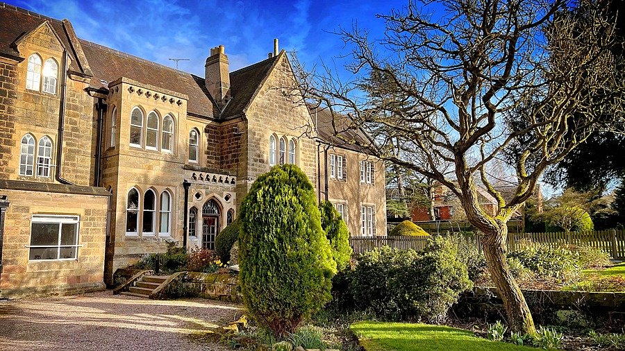 The beautiful old facade of the Repton School in the sunshine