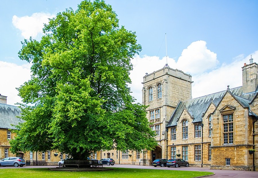 The Uppingham School from the front with its main entrance and big old tree in front