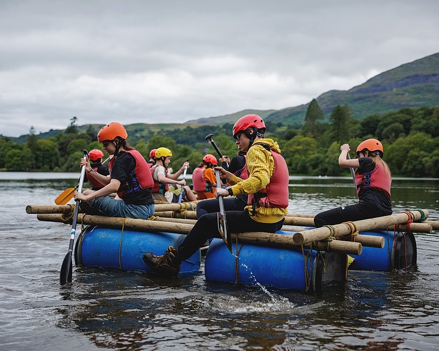 Students doing rafting on a river at Sedbergh International Summer School