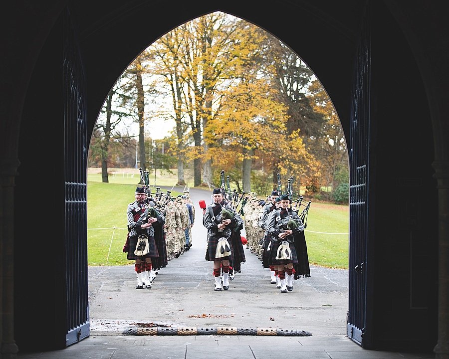The Glenalmons Pipers approaching the Front Arch of the school
