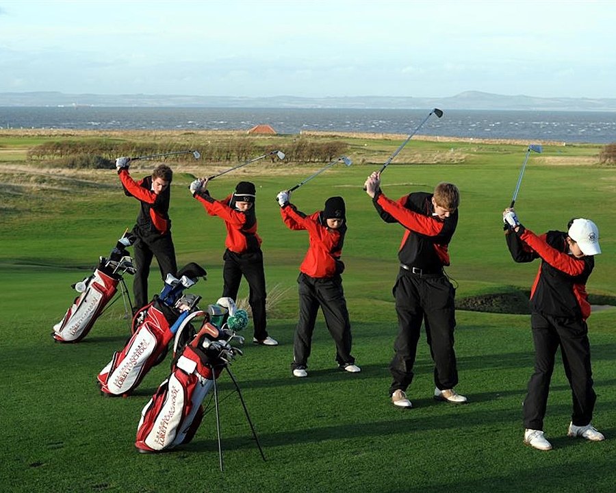 five Loretto students during their Golf training on the course by the sea