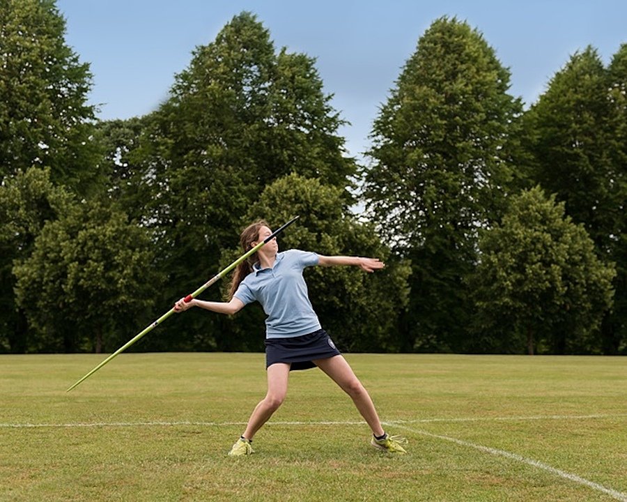 A girl throwing a javelin