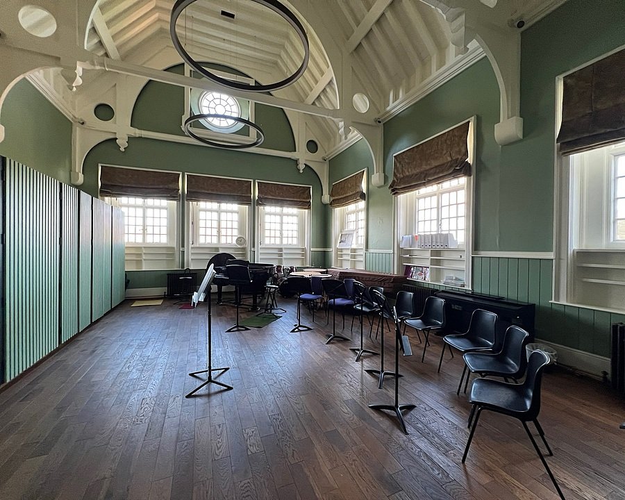 chairs in front of music stands in a crescent in a music classroom at Haileybury