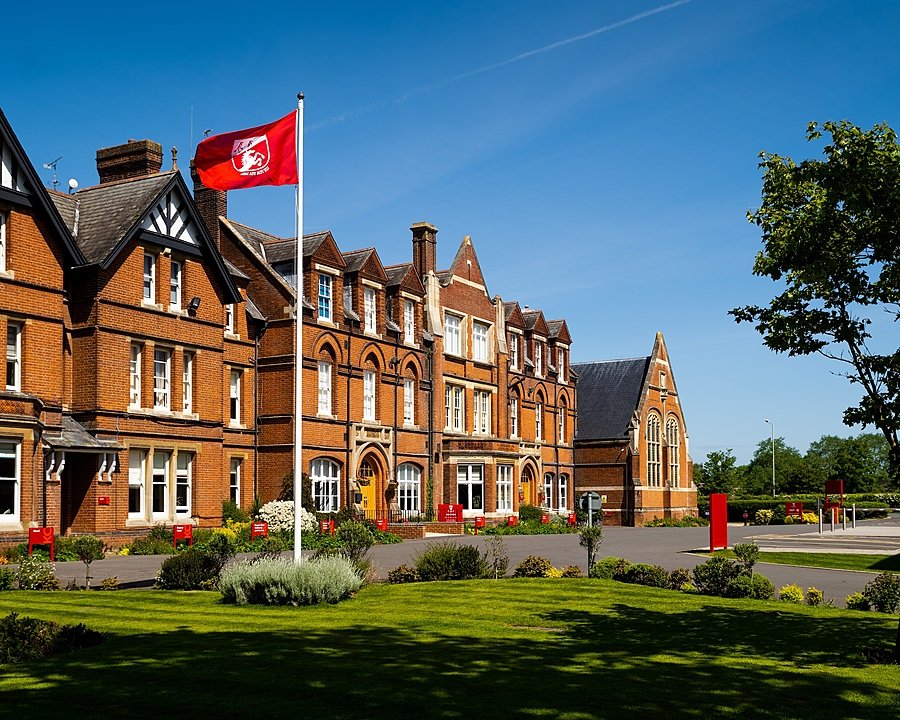 Kent College's red bricked main school building from the front