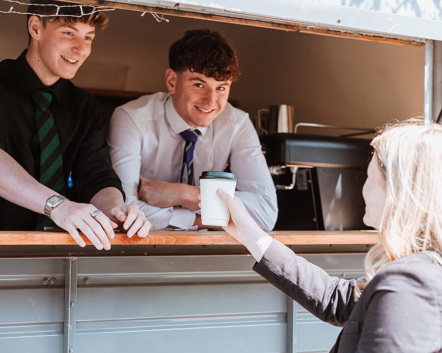 Students running a mobile coffee bar on the Wrekin College Campus