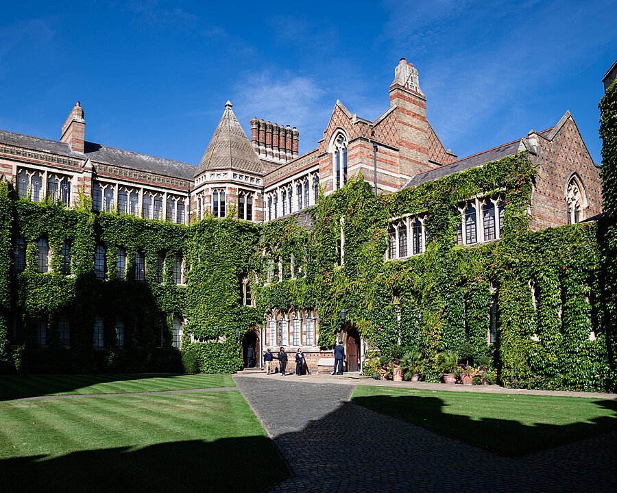 Rugby School Quad during summer with the surrounding school buildings covered in ivy