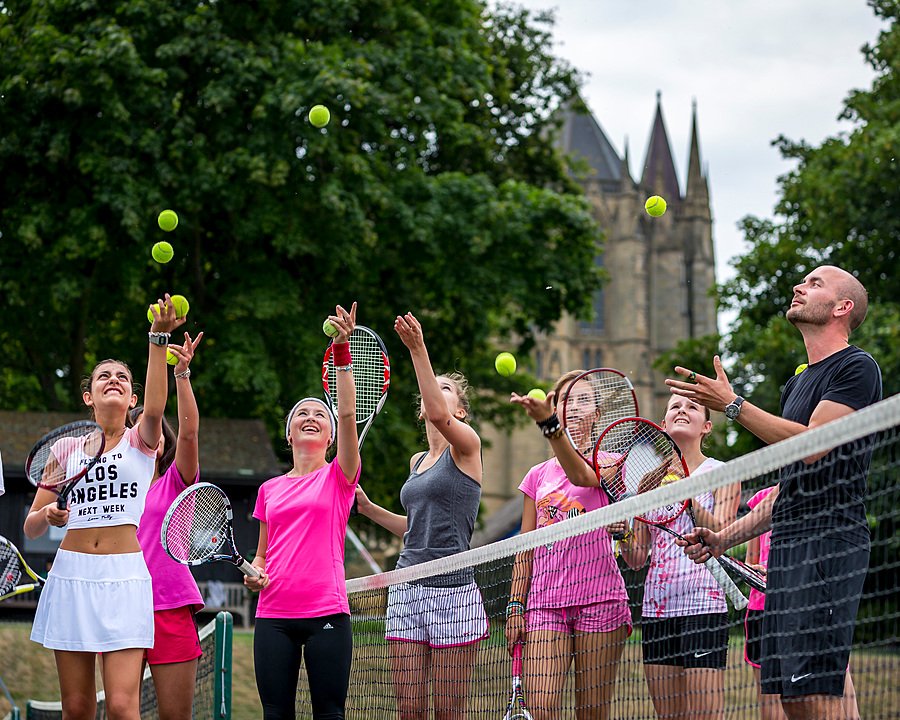 children in a tennis session at the Bede's Summer School on the Lancing campus