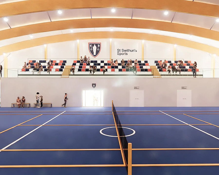 Beautiful, new, well-lit sports center of school with indoor tennis