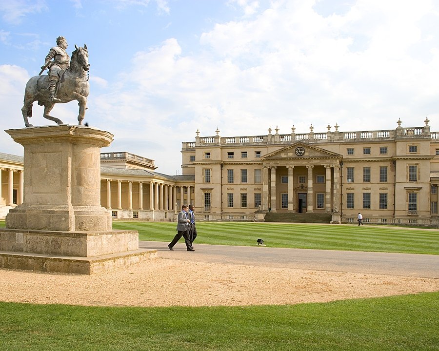 The North Front of Stowe School with Stoics on a massive open space green campus