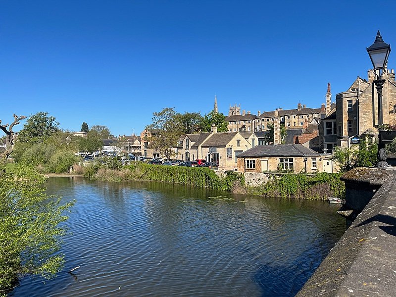 Riverside view with historic houses near English boarding school