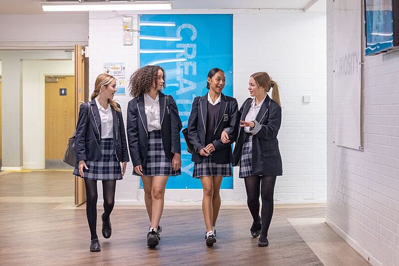 Four Students in the school uniforms at Bournemouth Collegiate School