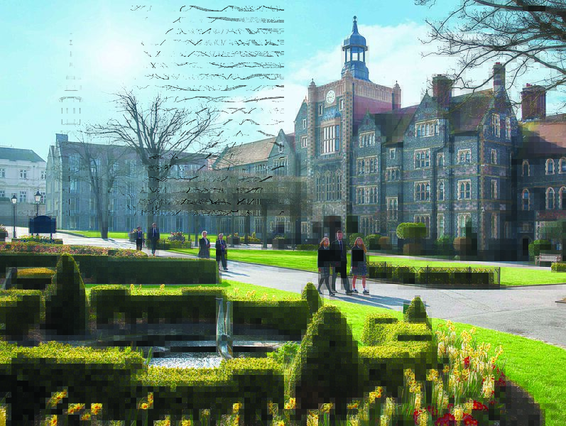 The lovingly landscaped campus with water feature and hedges in front of the impressive old building of Brighton College
