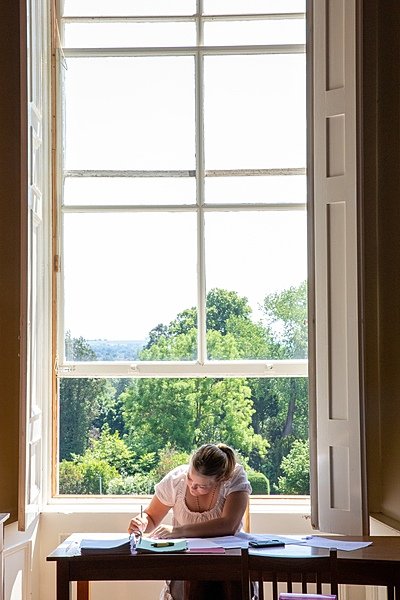 Bryanston student during her studies with a stunning view from her window behind