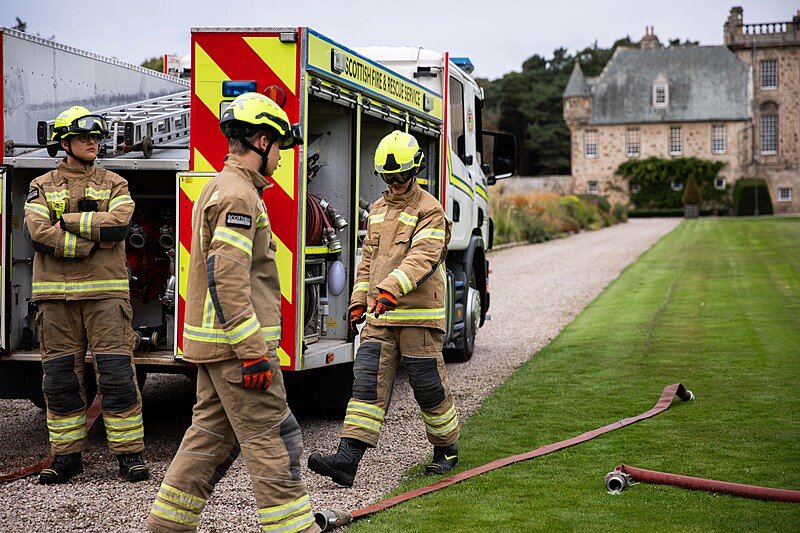 three Gordonstoun students as firemen with their own Fire Service and appliance