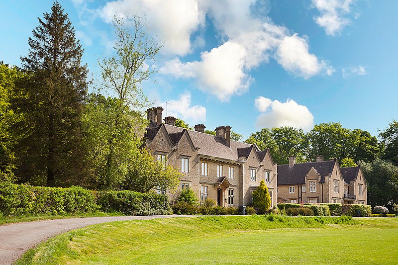 A couple of boarding houses situated on a pretty green school campus