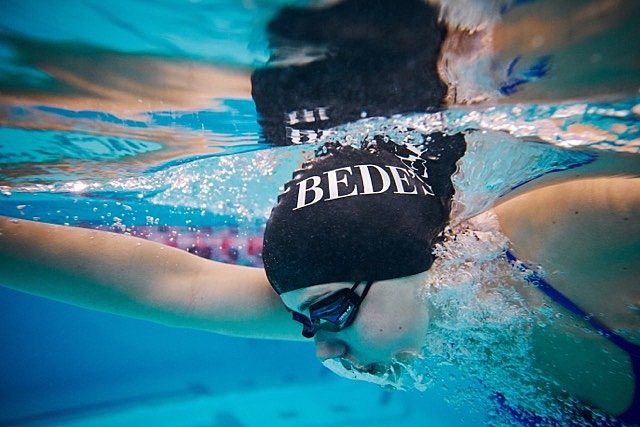 A female swimmer in close-up in Bede's School pool